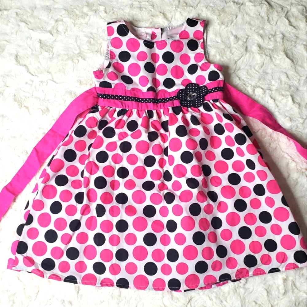 Super cute girl black and pink polka dot dress.